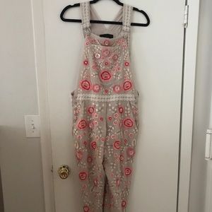 Needle and thread embroidered overalls